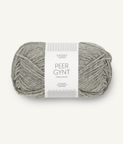 Ball of yarn with a label on a white background
